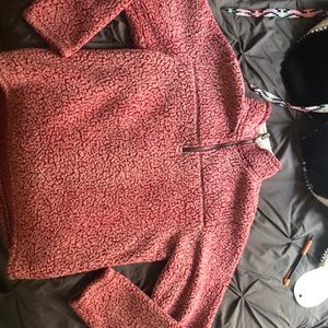 Red pull over fuzzy jacket